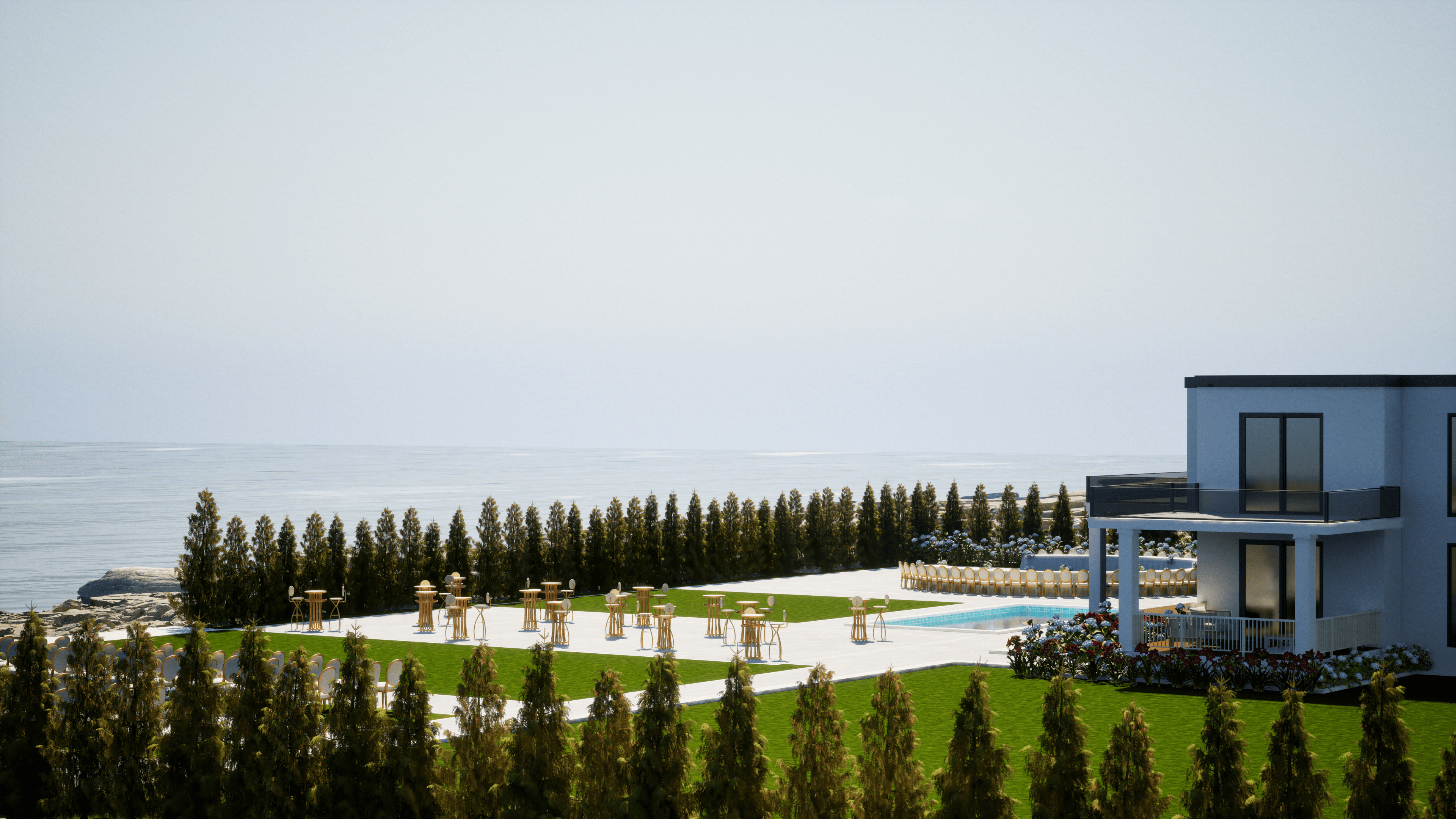 Daytime coastal overview of OZEA wedding venue in Paphos with the sea beyond the lawn and terraces.