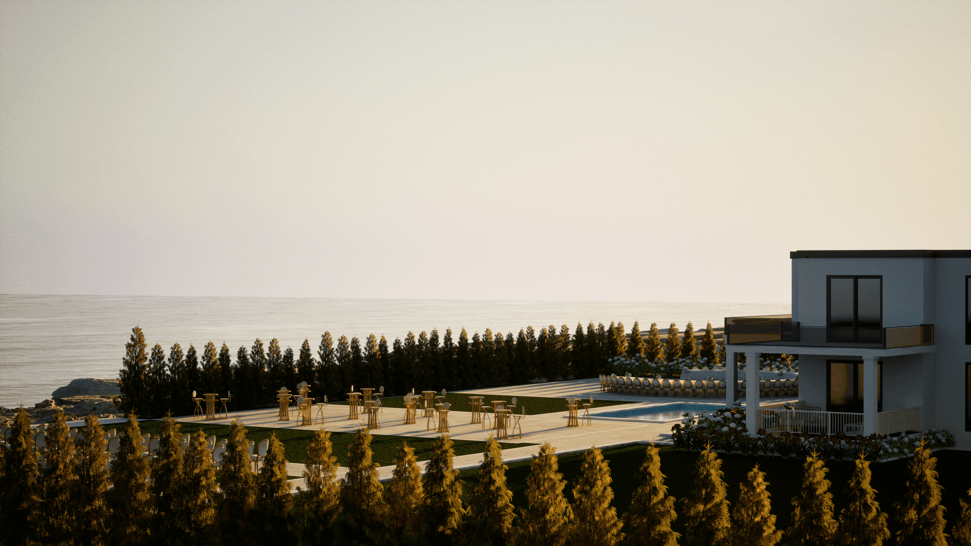 Evening sea-view rendering of OZEA wedding venue with the terrace and coastline illuminated at dusk.